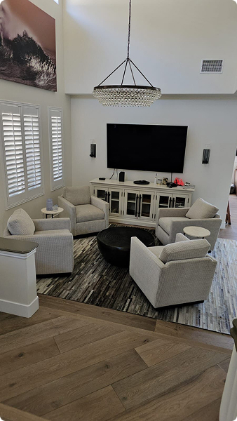 Clean white living room with sofas and natural light