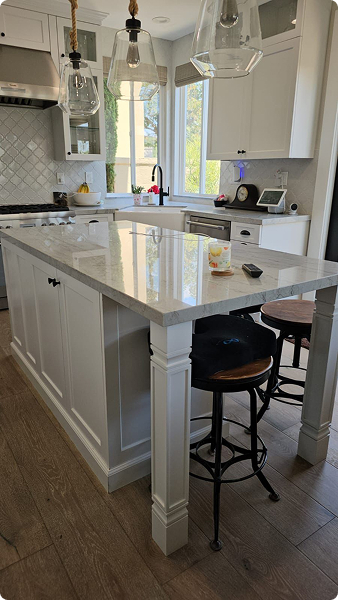 Kitchen island with stools cleaned to a shine